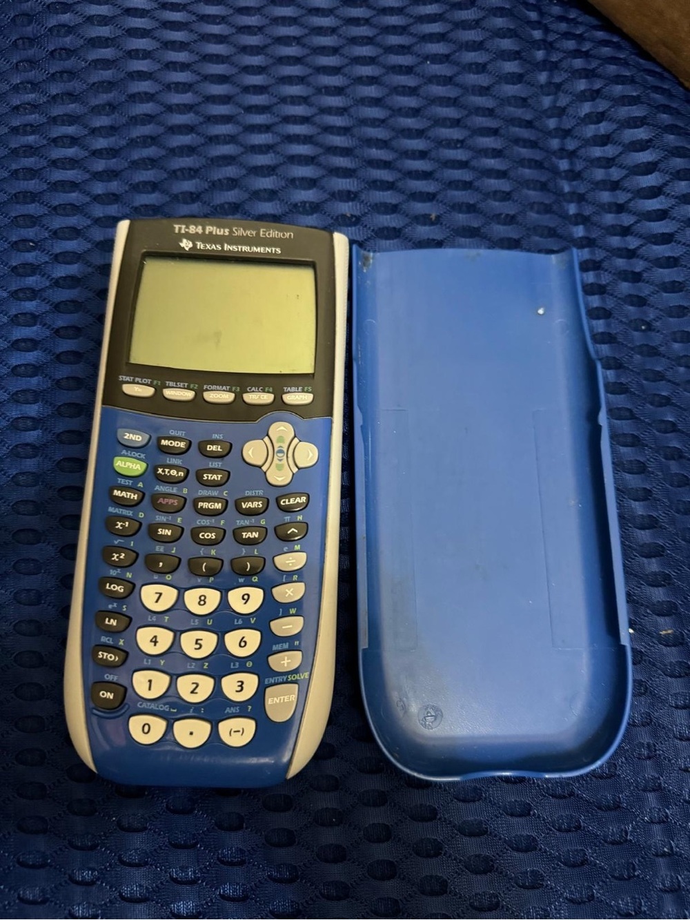 TI-84 Plus Silver Edition Graphing Calculator in Blue